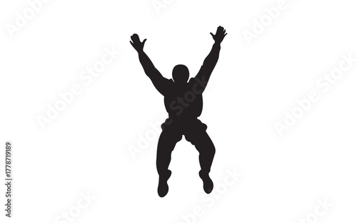 silhouette of a man jumping  and parachute