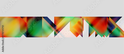 Abstract colorful geometric shapes form text. Bright hues blend, creating dynamic visual effect. Modern design, artistic expression.