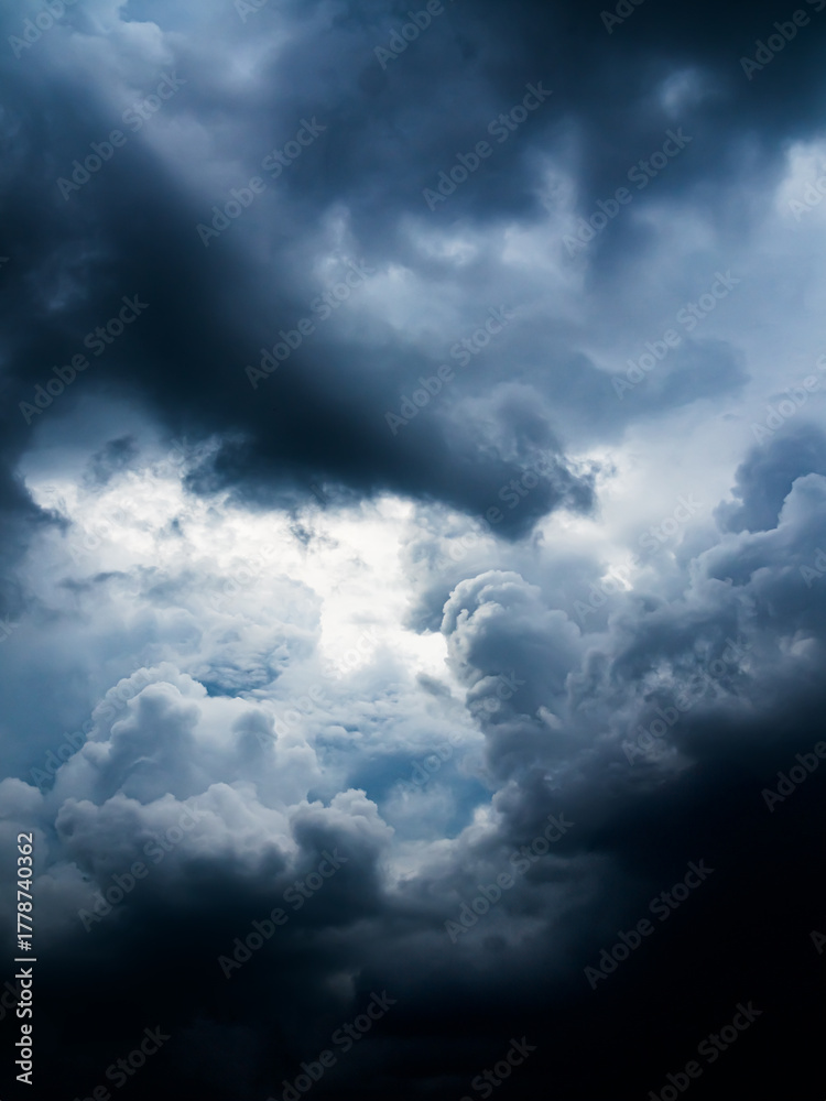 Fototapeta premium Cloud storm sky dark rain lightning thunder stormy typhoon nature light scene rainy atmosphere damage effect carbon dioxide dust air pollution 2.5 Pm, texture nature windstorm weather skyscape.