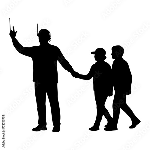 Adult guiding children walking holding hands