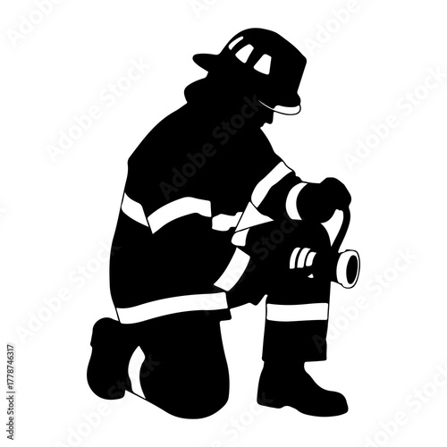 Firefighter kneeling with hose protective gear helmet