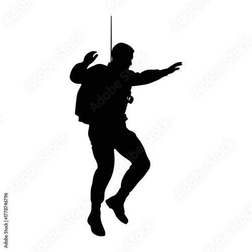 Man suspended mid air with backpack silhouette person