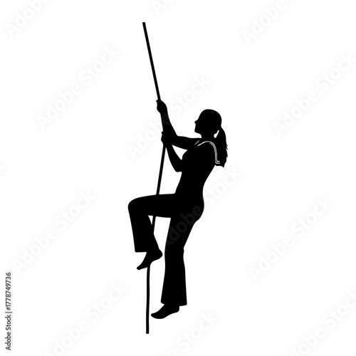 Silhouette woman climbing rope pole