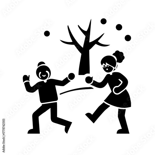 Two people having a snowball fight in winter