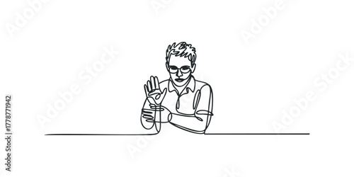 Person with glasses holding up hand