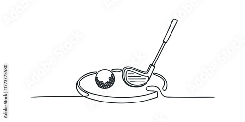 Golf club and ball on tee