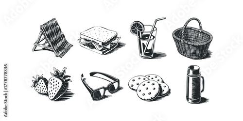 Collection of picnic items including sandwich, drink, and basket