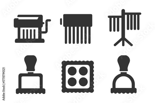 Collection of pasta making tools and stamps for homemade pasta crafting.