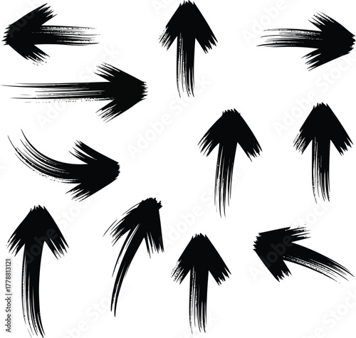 Collection of hand drawn black arrows in various directions with a brushstroke effect