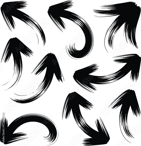 Collection of hand drawn black grunge arrows pointing in various directions on white background