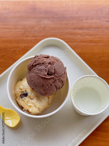 Homemade organic vanilla ice cream with mint, lemon ice cream and chocolate. Summer rest. Delicious and sweet dessert