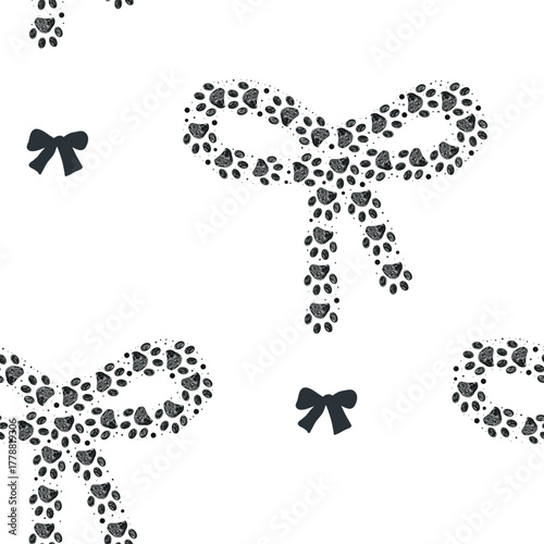 Made of paw prints bow ties seamless fabric design pattern