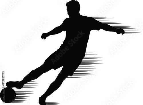 Dynamic silhouette of a soccer player in mid kick captured with a motion blur effect for a sense of speed and action