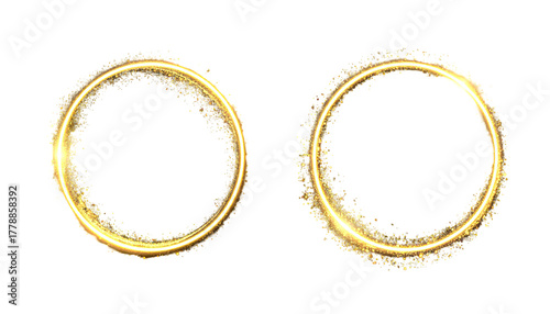 Two gold sparkling rings on black, circular, glowing effects