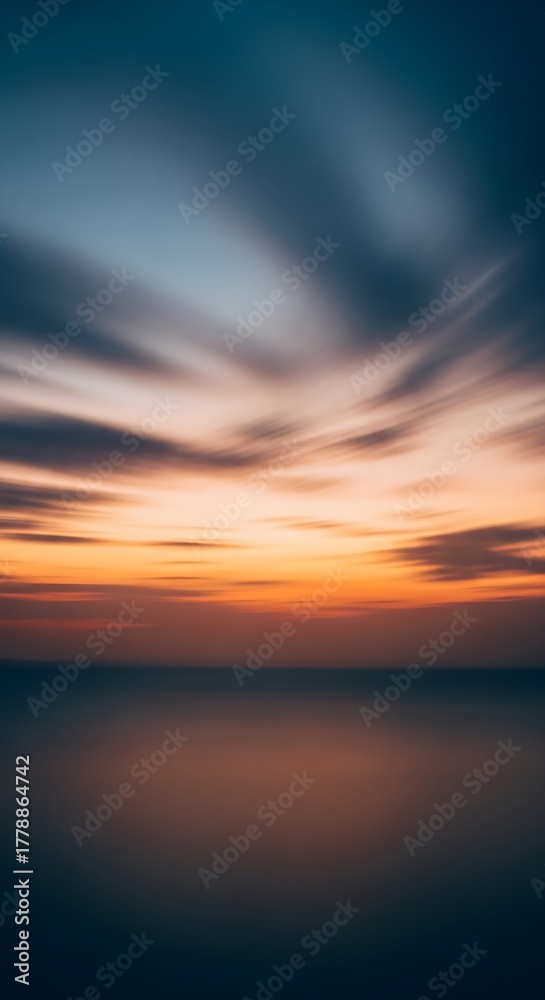 Fototapeta premium A serene sunset over the ocean creates a peaceful and calming atmosphere