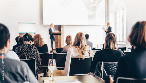 Interview and round table discussion at business convention and presentation. Audience at the conference hall. Business and entrepreneurship symposium.