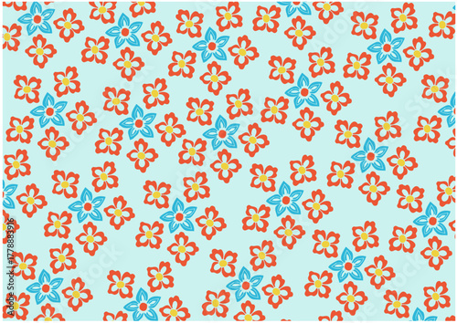 Floral pattern with red and blue flowers on a light blue background.