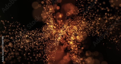 Golden glitter particles swirling in dark space, creating a magical festive atmosphere. Elegant abstract background for celebration, luxury events, or holiday video design projects.