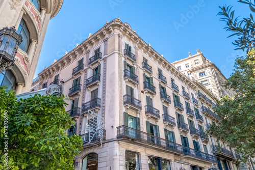Historic Corner Building Facade with Balconies in Barcelona City Center