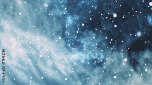 Abstract blue background with falling snowflakes and water drops on the window for a winter holiday celebration