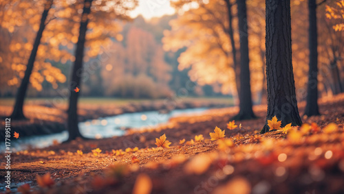A beautiful autumn landscape with a flowing river surrounded by trees with orange and yellow leaves