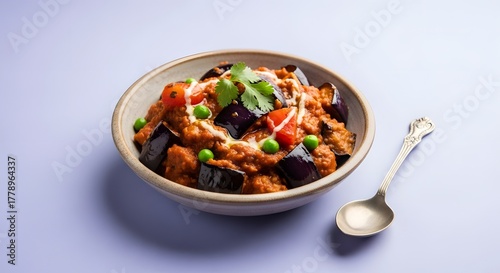 Delicious Indian Baingan Bharta Served in a Bowl with a Spoon