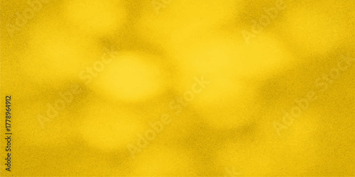 Abstract textured background with soft golden yellow watercolor washes and subtle paper grain