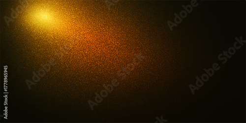 Warm golden light illuminates a textured surface with a subtle abstract pattern and dark background