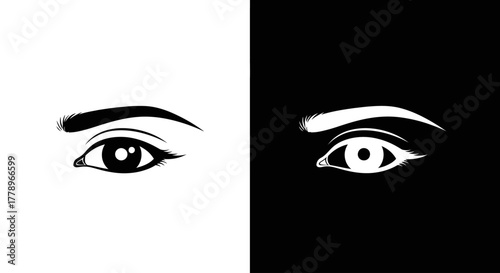 A minimalist graphic illustration of a woman's eye shown in black on a white background and its inverse.