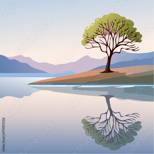 solitary tree reflected in the still waters of a foggy lake at sunrise