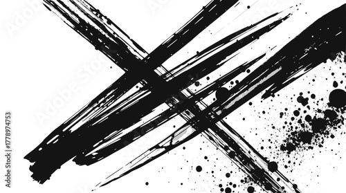 Abstract black ink brush strokes and splatter on a