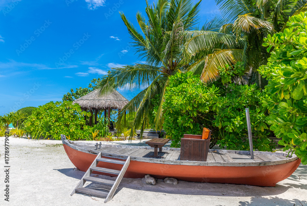 Fototapeta premium Leisure Boat Anchored Near Tropical Beach In Maldives Paradise