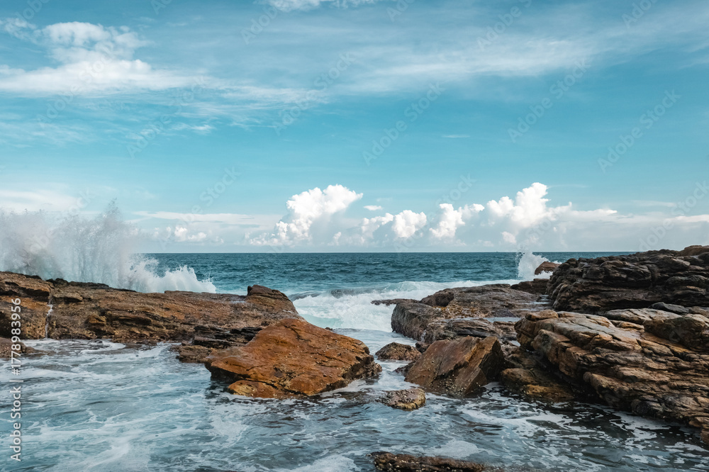 Fototapeta premium Dramatic Coastal Landscape With Ocean Waves Crashing Against Rocks