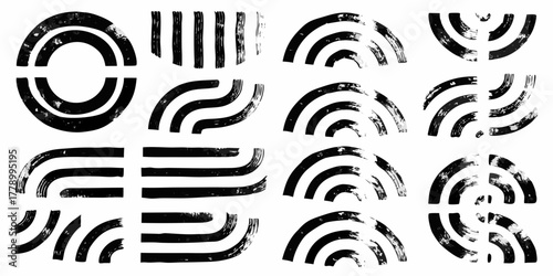 Collection of abstract black brush stroke shapes and patterns on white background