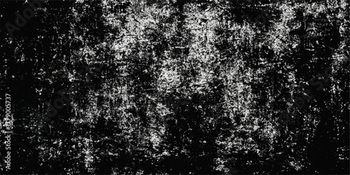 Textured grunge pattern of vintage grey water drops on a black concrete surface backdrop