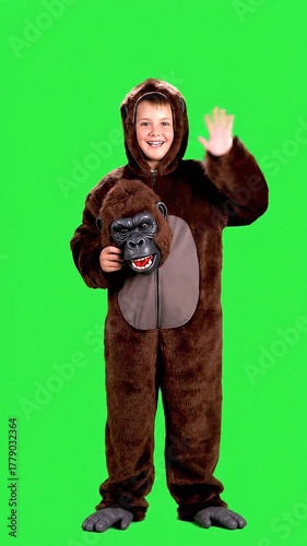 Cute Young Boy in Gorilla Costume Holding Gorilla Mask – Fun Kids Dress Up Concept