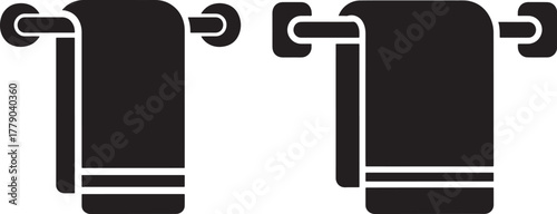 Two towels hanging on a towel rack silhouette