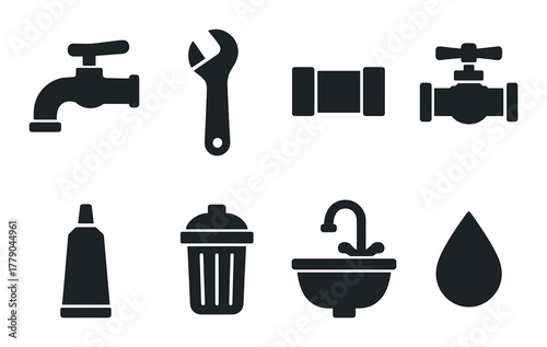 Silhouettes of plumbing tools and objects on black background