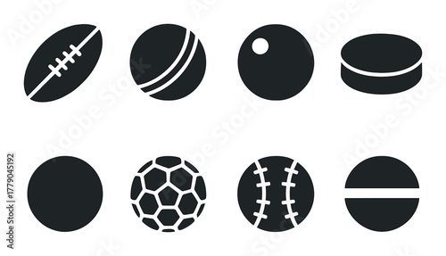 Silhouettes of various sports balls on dark background