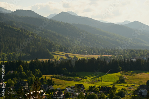 Fototapeta Naklejka Na Ścianę i Meble -  Beautiful, scenic view of Cyrhla village near Zakopane, Poland. Summer evening