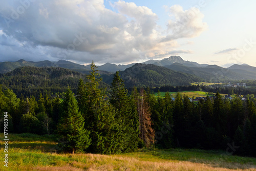 The peaks of High Tatra moutains. Beautiful, scenic view from Cyrhla village near Zakopane, Poland. Summer evening