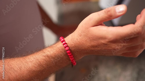 A CloseUp and Detailed View of Vibrant and Colorful Beaded Bracelets Adorning an Arm