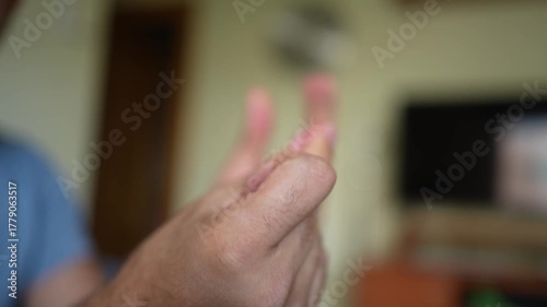A detailed closeup view of hands expertly performing various finger exercises for strength
