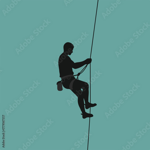 Silhouette of a person rappelling down a vertical rope with equipment against a teal background
