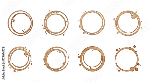 Collection of brown circular coffee stain patterns forming abstract design elements