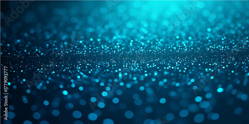 Bright water drops on a blue glass texture create a glittering pattern with bokeh lights as a shiny wallpaper