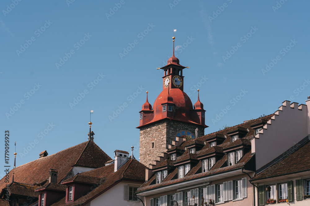 Obraz premium Luzern old town hall clock tower dominating rooftops