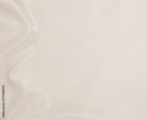 Smooth elegant golden silk or satin luxury cloth texture as wedding background. Luxurious background design. In Sepia toned. Retro style