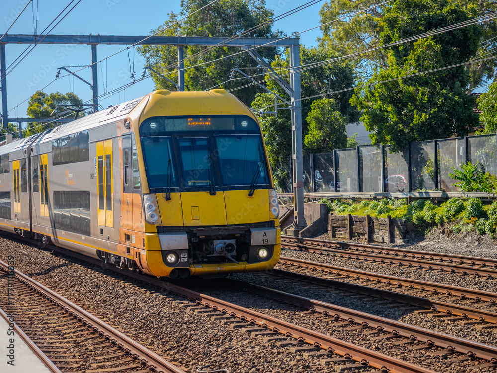 Naklejka premium 5 November 2025 passenger Train going through Summer Hill train station a suburban Sydney train Station NSW Australia