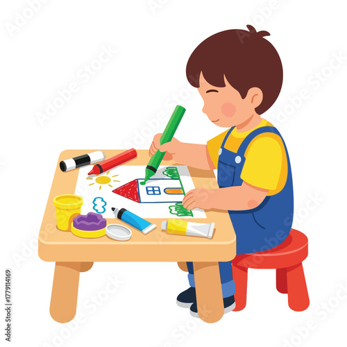 Cute little boy drawing a house at his table with crayons happily